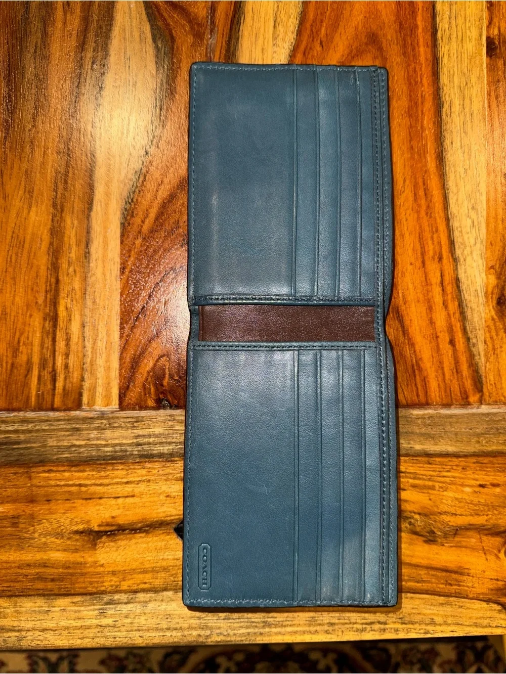 Beautiful blue and brown Coach men’s style leather wallet
